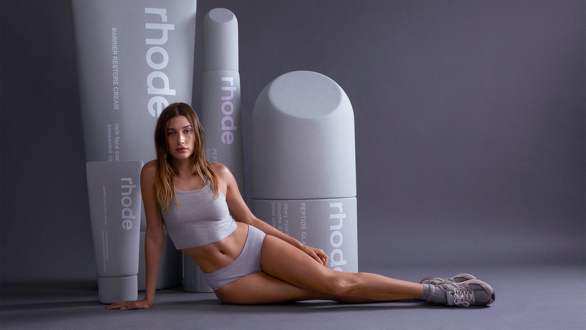 Hailey Bieber Elicits Negative Reactions From Fans For Being Pantless For The Rhode Skin Calendar