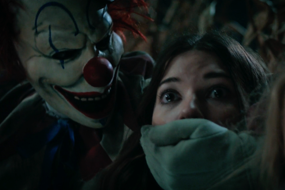 ‘Clown in a Cornfield’ Trailer: Frendo the Clown Murders Victims in Gory Slasher From ‘Smile’ Producers